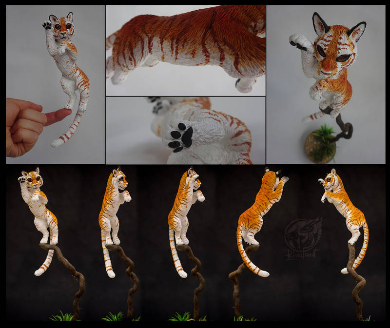 Taby Tiger companion sculpture balance tiger tabytiger golden