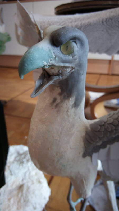 sculpture art bird treasure  going from bald to fully feathered
